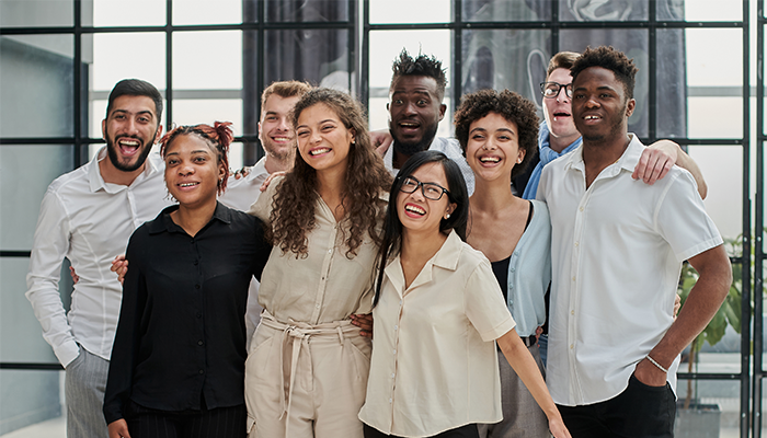 group of happy people in an office